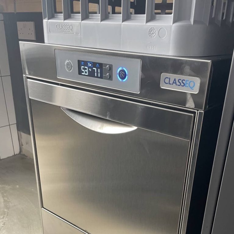 A stainless steel dishwasher with digital display and controls.